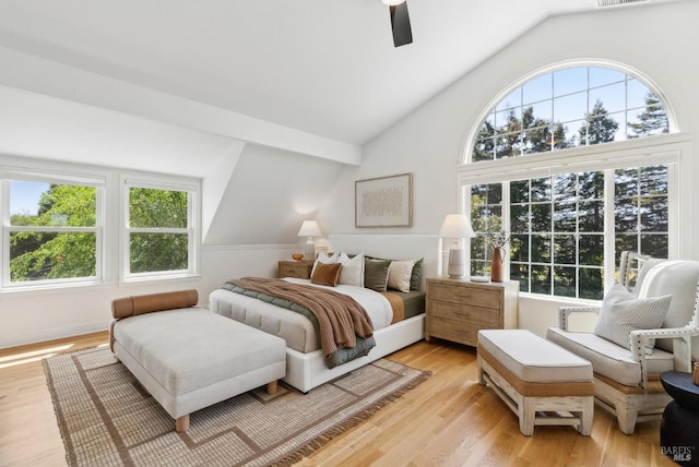 1030 Thompson Ln, Petaluma, CA 94952 - bedroom with multiple windows, vaulted ceiling, light wood-style flooring, and a ceiling fan