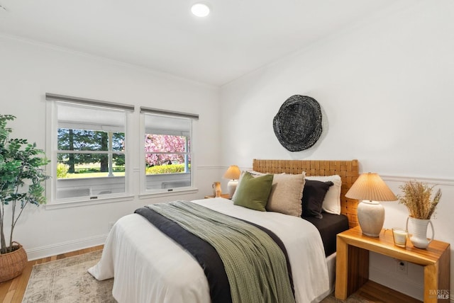 1030 Thompson Ln, Petaluma, CA 94952 - bedroom with crown molding, wood finished floors, and baseboards