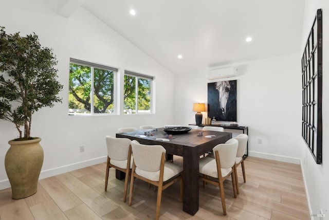 1030 Thompson Ln, Petaluma, CA 94952 - dining room with a wall mounted AC, recessed lighting, baseboards, light wood-style flooring, and high vaulted ceiling
