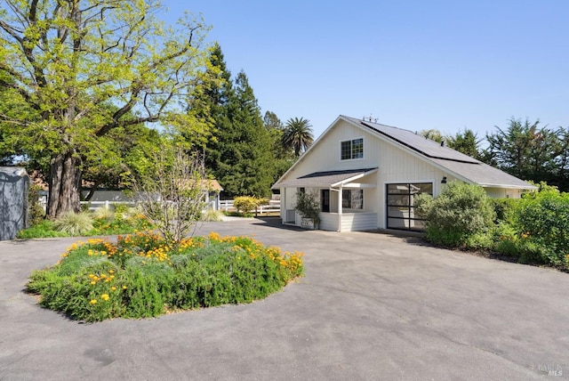 1030 Thompson Ln, Petaluma, CA 94952 - view of front facade featuring solar panels