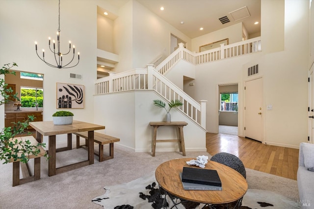 interior space with a wealth of natural light, stairs, and visible vents