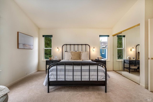 bedroom with baseboards and carpet flooring