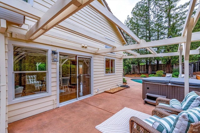 view of patio / terrace featuring fence, a pergola, an outdoor hangout area, and a hot tub