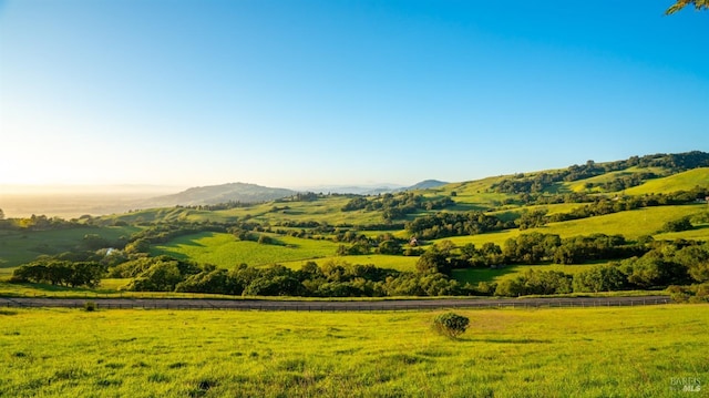 view of mountain feature featuring a rural view