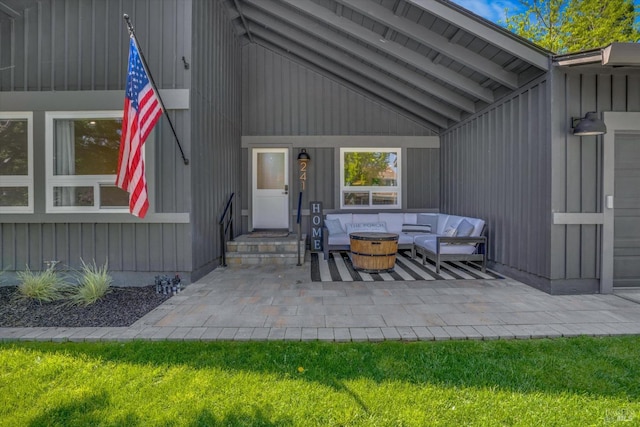 exterior space featuring a patio area and an outdoor hangout area