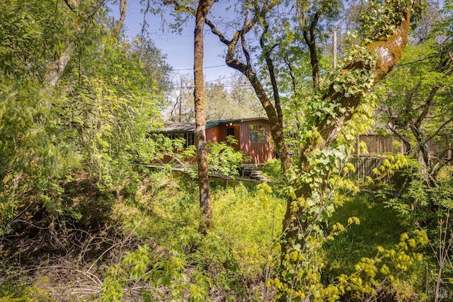 view of yard with fence