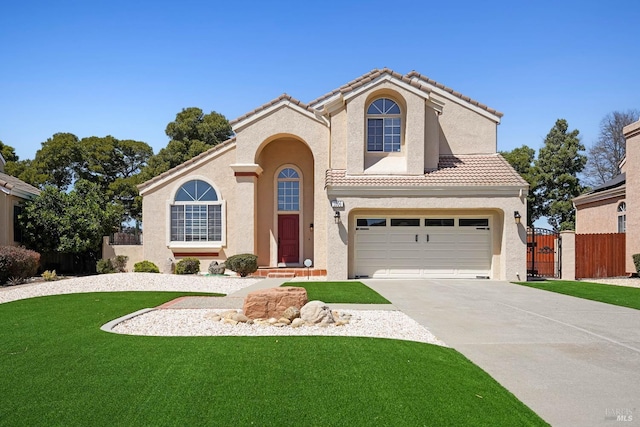 1006 Armsby Way, Suisun City, CA 94585 - mediterranean / spanish home featuring driveway, stucco siding, an attached garage, and a tile roof