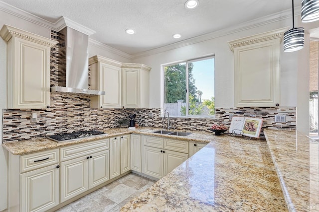 1006 Armsby Way, Suisun City, CA 94585 - kitchen featuring wall chimney range hood, a sink, stainless steel gas stovetop, cream cabinetry, and decorative backsplash