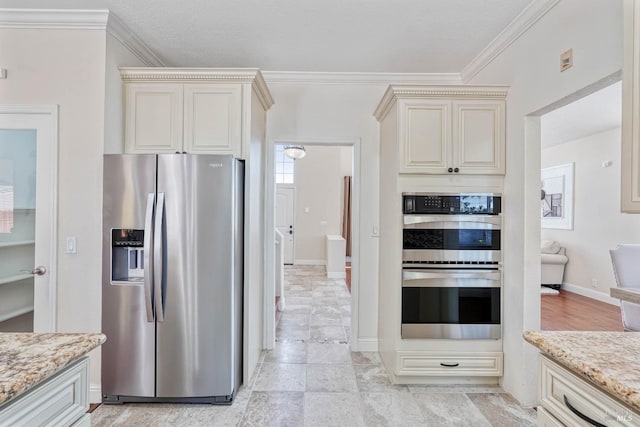 1006 Armsby Way, Suisun City, CA 94585 - kitchen with appliances with stainless steel finishes, cream cabinetry, crown molding, and light stone countertops