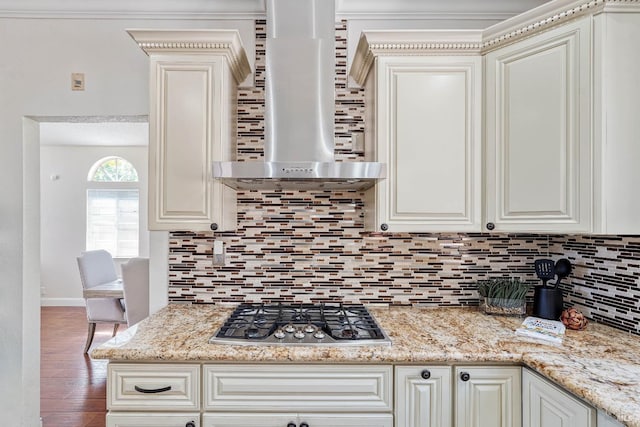 1006 Armsby Way, Suisun City, CA 94585 - kitchen with wall chimney range hood, stainless steel gas cooktop, decorative backsplash, and wood finished floors