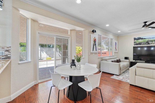 1006 Armsby Way, Suisun City, CA 94585 - dining area featuring crown molding, baseboards, healthy amount of natural light, hardwood / wood-style flooring, and recessed lighting