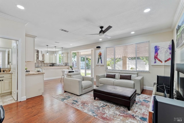 1006 Armsby Way, Suisun City, CA 94585 - living room featuring ceiling fan, ornamental molding, light wood-type flooring, recessed lighting, and baseboards