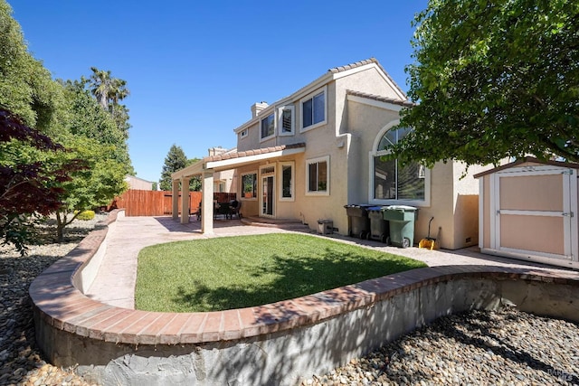 1006 Armsby Way, Suisun City, CA 94585 - rear view of property featuring stucco siding, a patio area, and a chimney