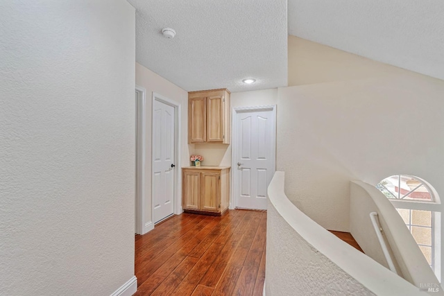 1006 Armsby Way, Suisun City, CA 94585 - hall with dark wood finished floors, baseboards, a textured ceiling, recessed lighting, and a textured wall