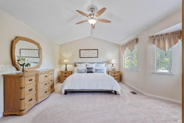1006 Armsby Way, Suisun City, CA 94585 - bedroom featuring light carpet, a textured ceiling, baseboards, lofted ceiling, and a ceiling fan