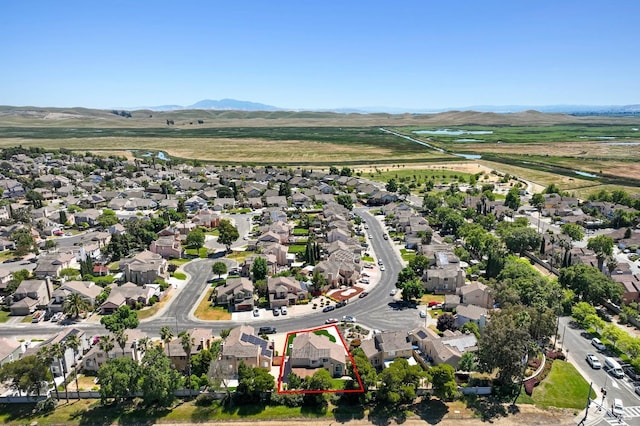 1006 Armsby Way, Suisun City, CA 94585 - aerial perspective of suburban area featuring property parcel outlined and a mountain backdrop
