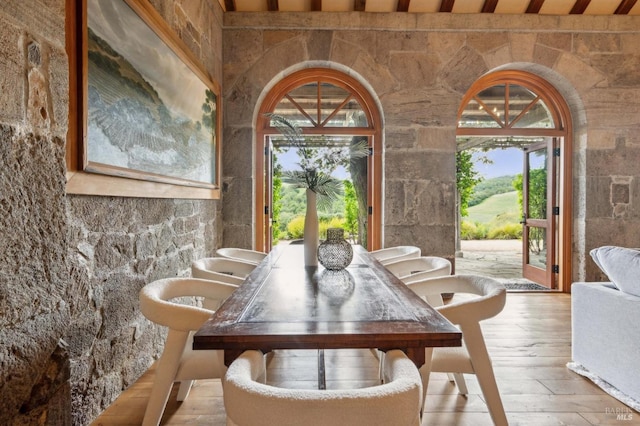 dining area with hardwood / wood-style flooring