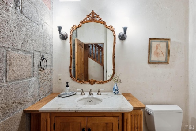 half bath with toilet and vanity