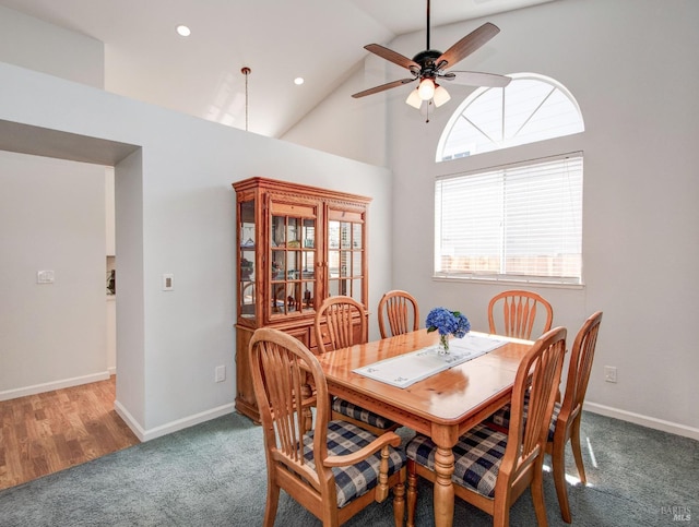 dining area featuring high vaulted ceiling, a ceiling fan, baseboards, carpet flooring, and recessed lighting