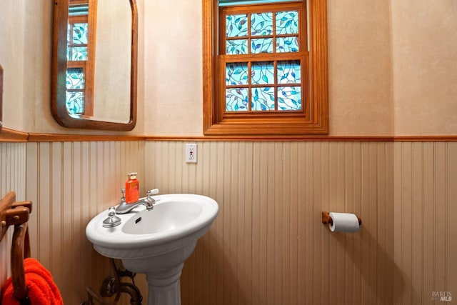 bathroom featuring wainscoting