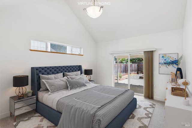bedroom with baseboards, high vaulted ceiling, light colored carpet, and access to exterior