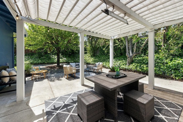 view of patio featuring a pergola, an outdoor hangout area, and outdoor dining space