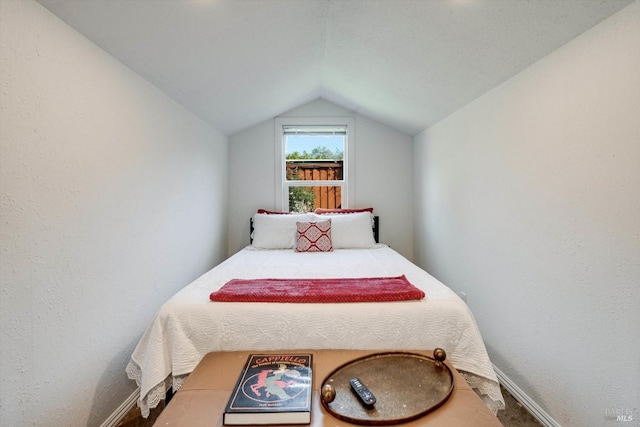 1416 F St, Napa, CA 94559 - bedroom featuring lofted ceiling, carpet floors, and a textured wall