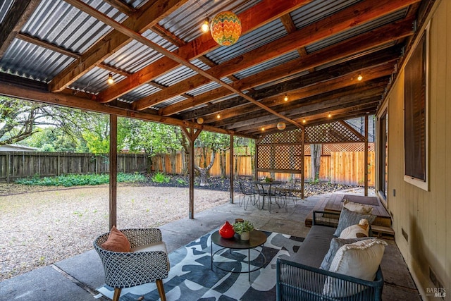 view of patio featuring a fenced backyard and outdoor dining space