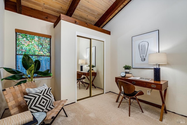 home office featuring lofted ceiling with beams, wooden ceiling, and carpet floors