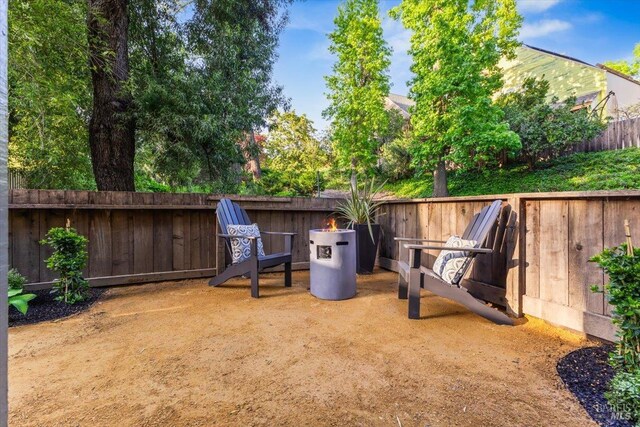exterior space featuring a patio and fence
