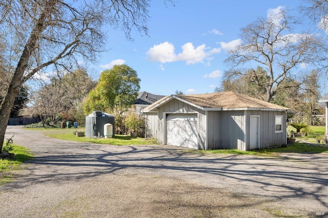garage featuring driveway
