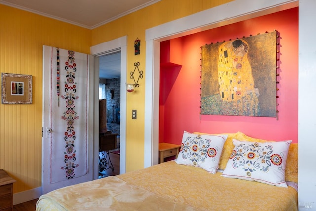 bedroom with crown molding
