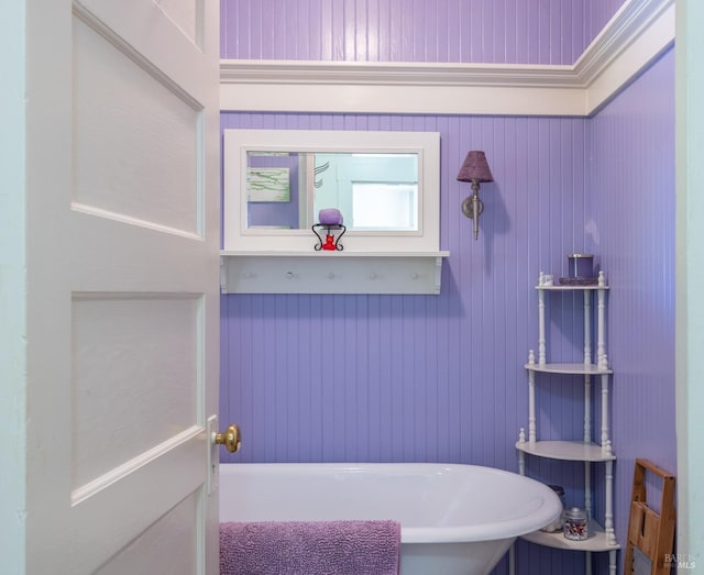 bathroom with a soaking tub