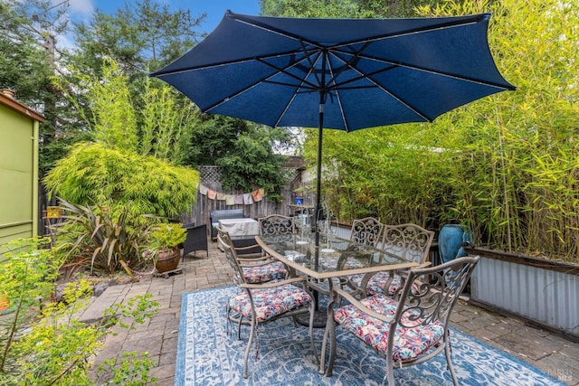 view of patio / terrace with fence and outdoor dining space