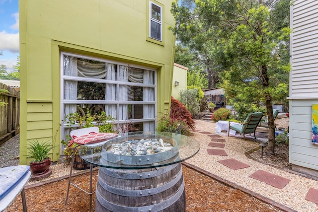 view of patio featuring fence