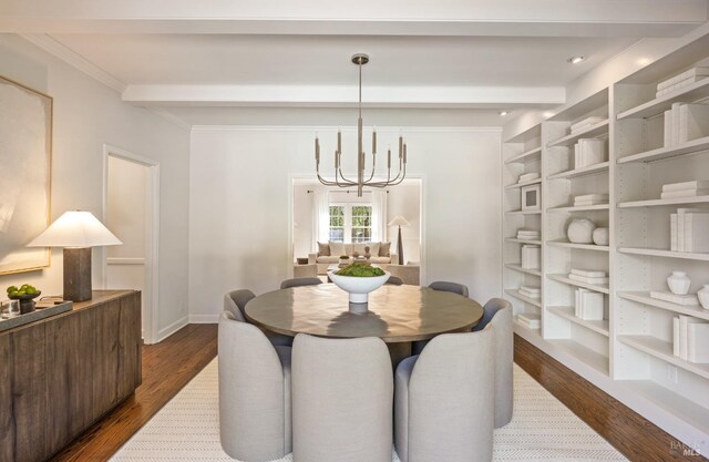 dining area featuring beam ceiling, baseboards, an inviting chandelier, and dark wood-style flooring