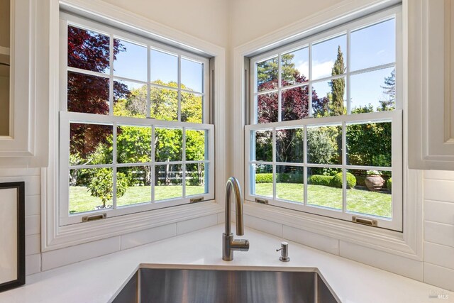 room details with a sink and light countertops