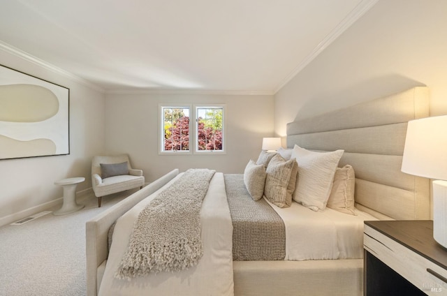 bedroom with baseboards, visible vents, carpet floors, and crown molding