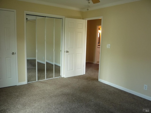 unfurnished bedroom featuring baseboards, carpet flooring, and ornamental molding