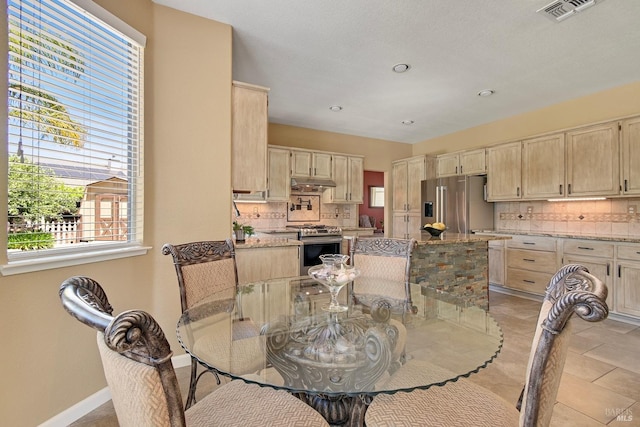 dining room featuring recessed lighting, visible vents, baseboards, and light tile patterned floors