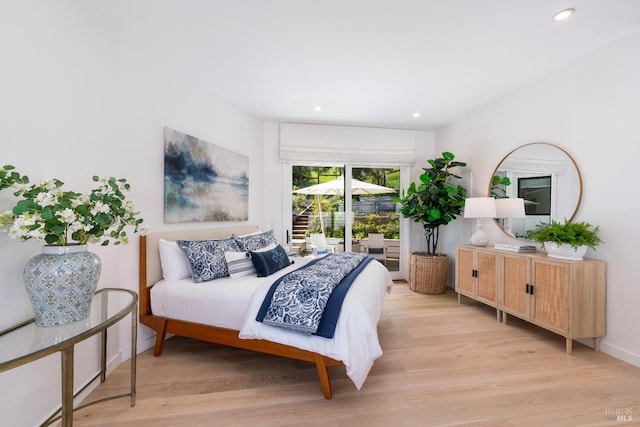 bedroom featuring baseboards, access to exterior, light wood finished floors, and recessed lighting