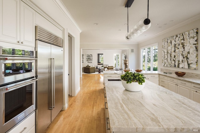 656 Goodhill Rd, Kentfield, CA 94904 - kitchen with white cabinets, light wood finished floors, crown molding, appliances with stainless steel finishes, and open floor plan
