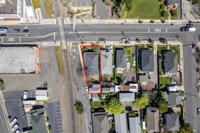 birds eye view of property with a residential view