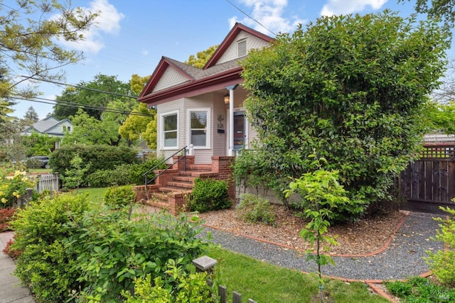 view of front of home with fence