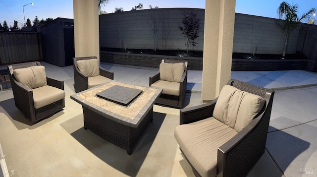 view of patio / terrace with a fenced backyard and an outdoor living space