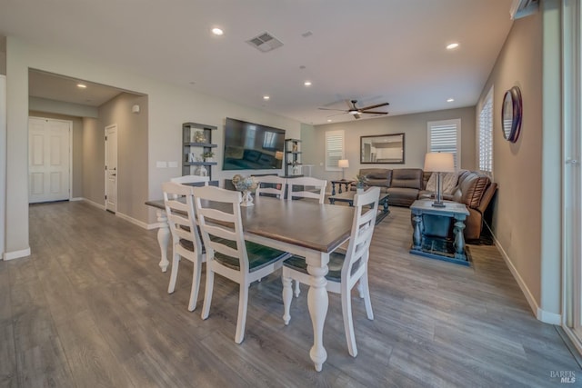 dining space featuring visible vents, a ceiling fan, and baseboards