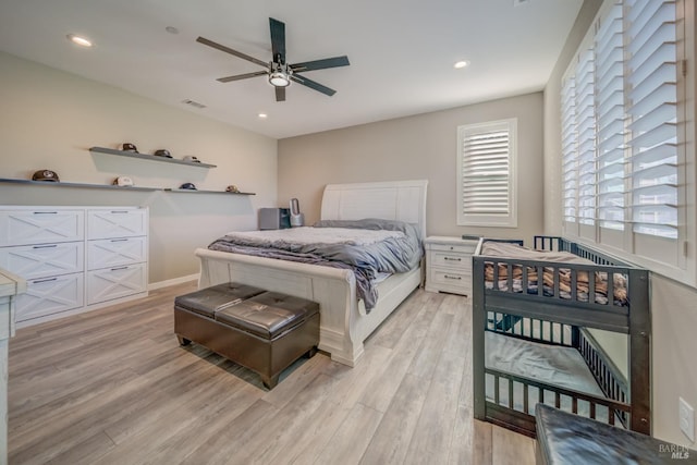 bedroom with visible vents, recessed lighting, light wood finished floors, and baseboards