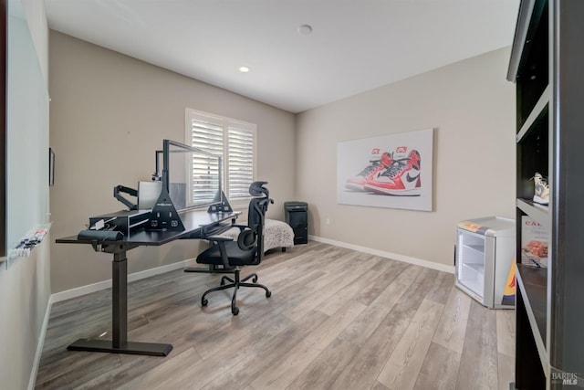 home office featuring recessed lighting, baseboards, and wood finished floors