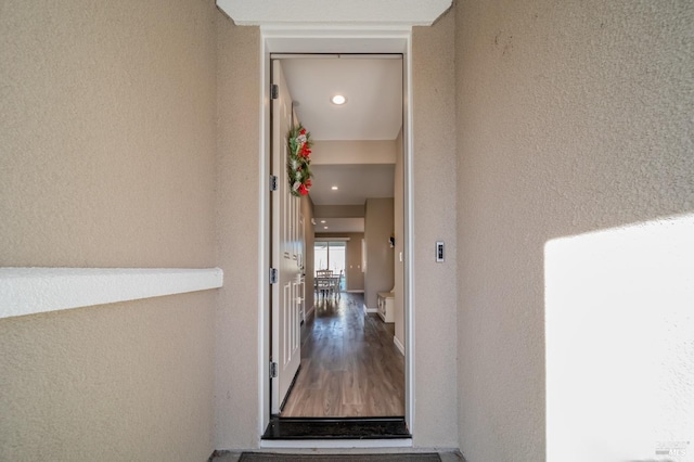 property entrance featuring stucco siding