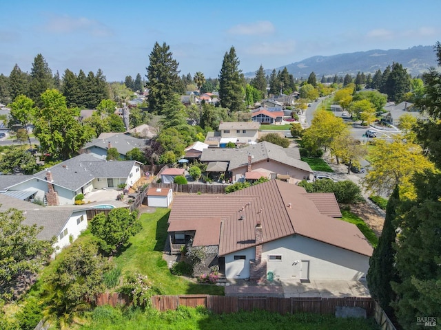 bird's eye view featuring a mountain view and a residential view